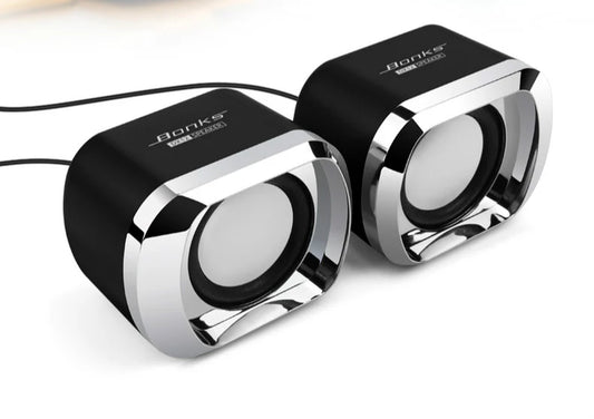 DX12 Compact Mini Speaker – Big Sound in Small Form